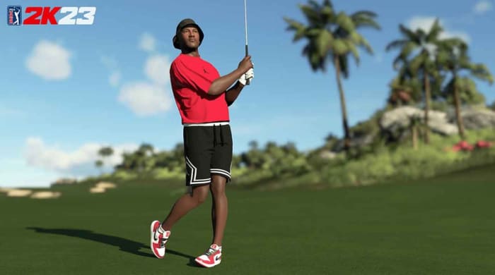 Michael Jordan swings in a screenshot from the PGA Tour 2K23 video game.